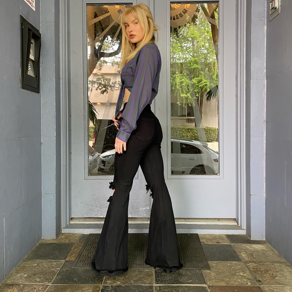 Distressed black bellbottoms